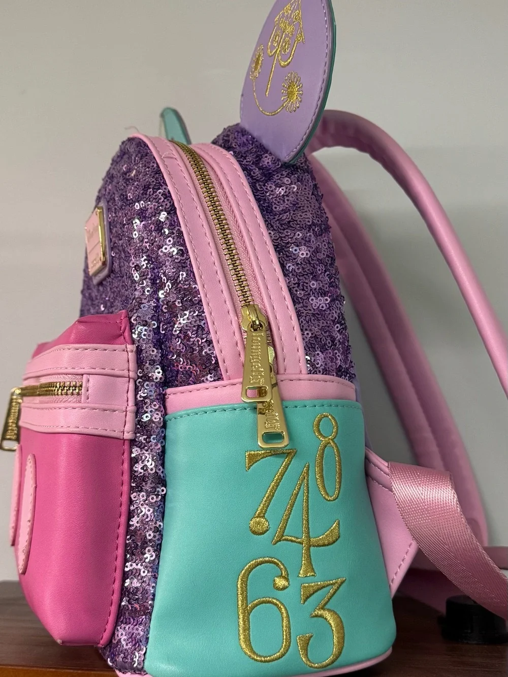 MMMA Mickey Mouse Main Attraction It’s a Small World Loungefly Mini Backpack